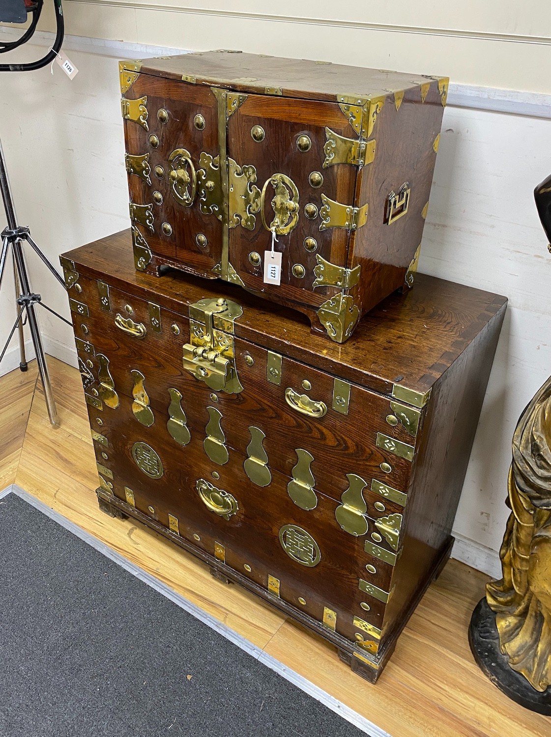 A 19th century Korean brass mounted zelkova bandaji chest and a similar 'safe' cabinet, The larger cabinet height 92cm, width 104cm, depth 52cm deep, the smaller cabinet height 45.5cm, width 59cm, depth 35cm